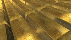 Цена на золото снизилась по итогам вечернего межбанковского фиксинга в Лондоне в четверг 