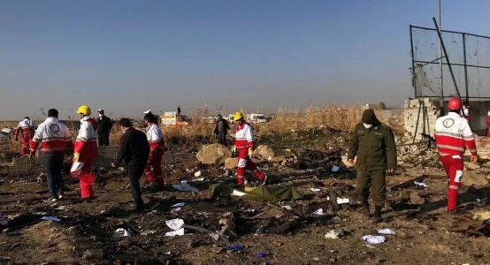 Crashed plane in Iran might have collided with military drone - experts
