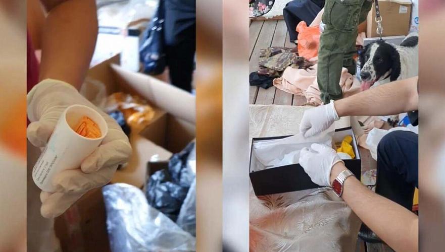 Несколько бочек с сырьем для синтетических наркотиков нашли в нарколаборатории в Алматы